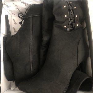 Black thought high heels with tie up laces New in box
